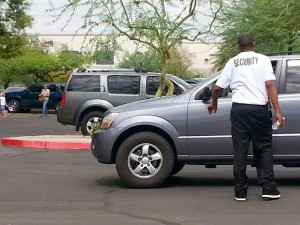 Security Guard at Service in a Parking Lot at the Warehouse Event